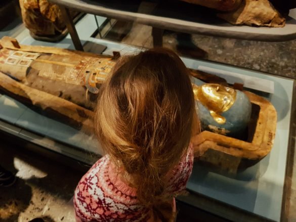 Girl watching mummies British Museum
