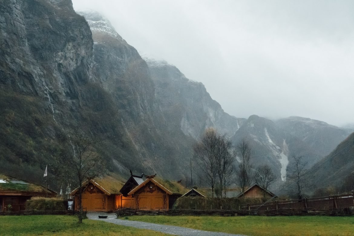 Viking Valley village in Gudvangen surrounded by tall mountains